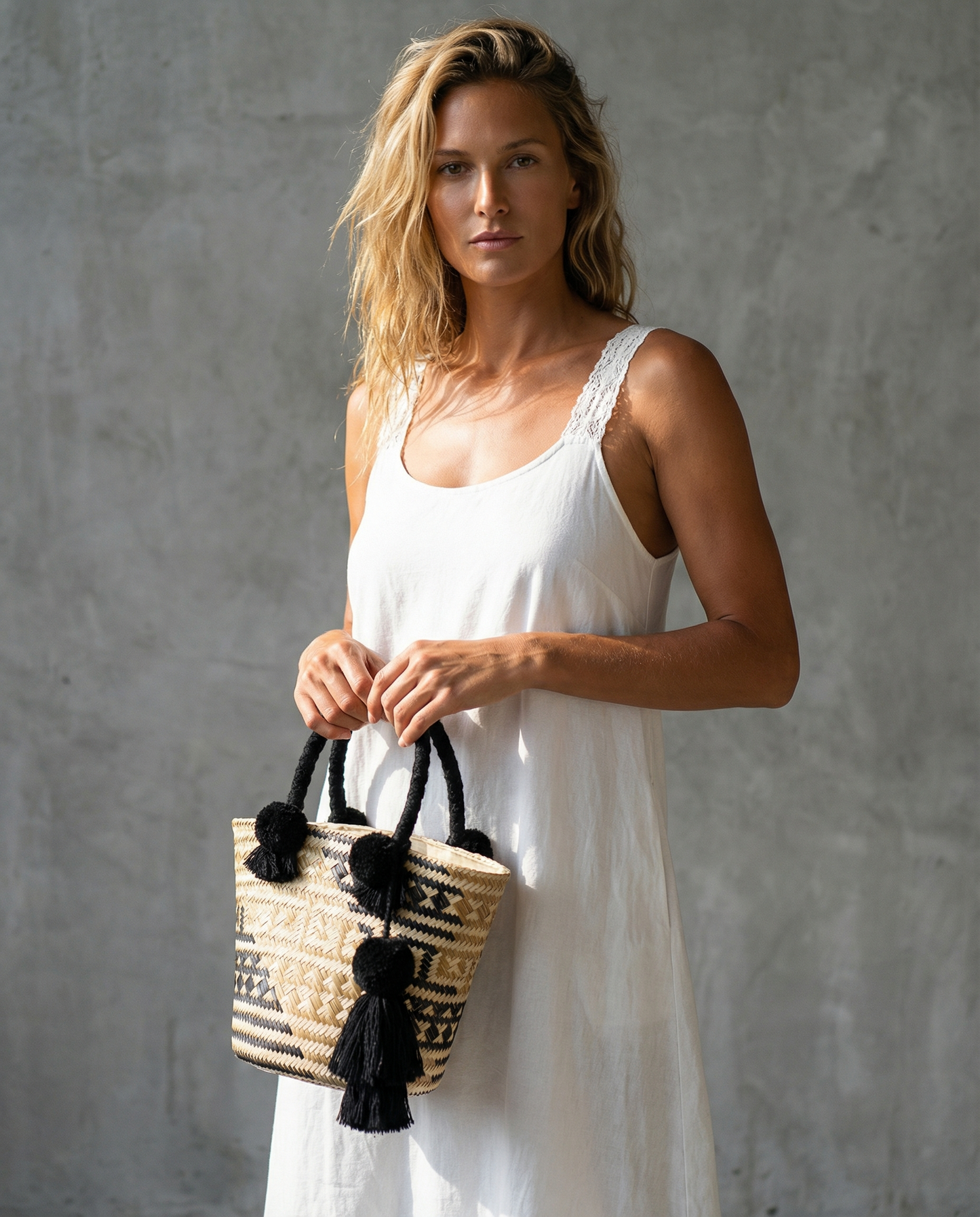 Handmade basket bag with pompom and tassel