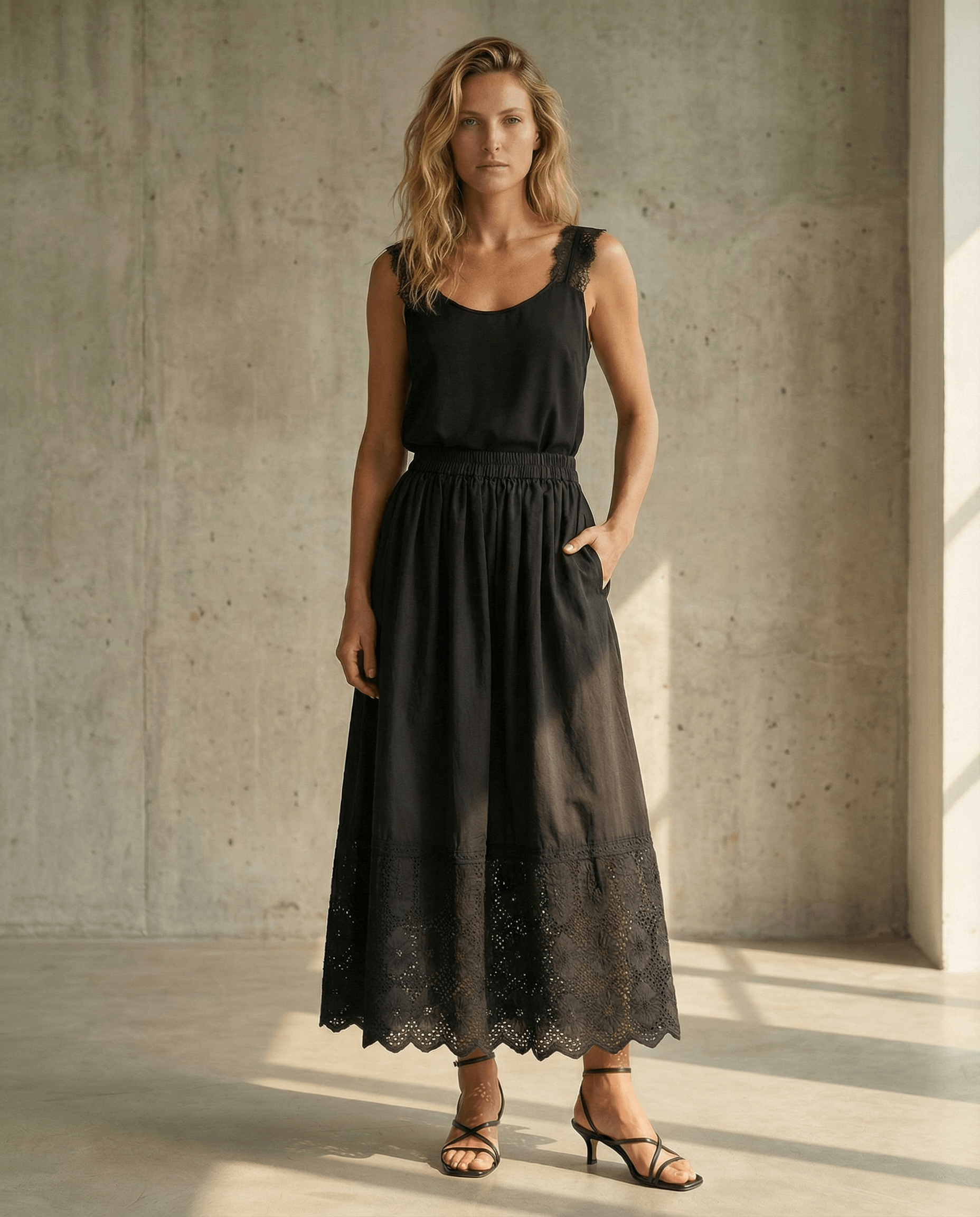 Zoey schwarzer Baumwoll-Midirock